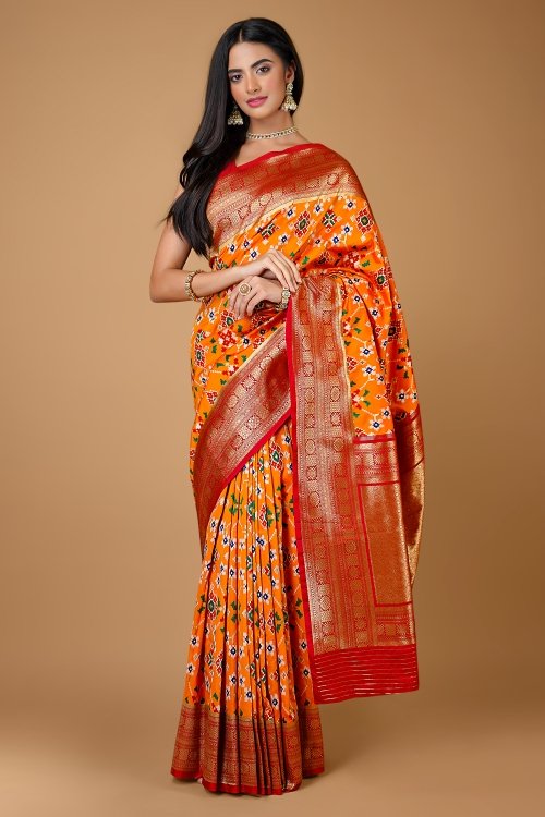 Orange Traditional Patola Woven Saree in Silk with Contrast Border and Pallu