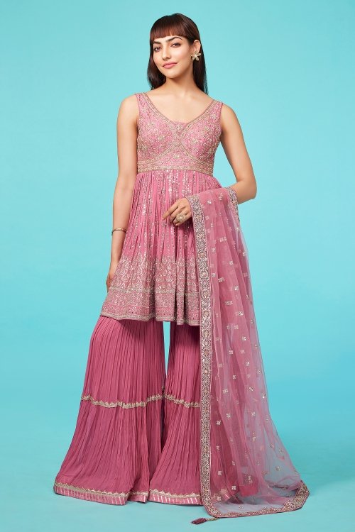 Thulian Pink Colored Peplum Sharara Suit in Georgette with Intricate Zardosi and Sequin Work