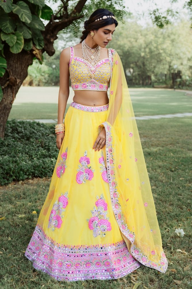 Buy Yellow Raw Silk Embroidered Mirror Work V Neck Bridal Lehenga Set For  Women by Nitara Dhanraj Label Online at Aza Fashions.