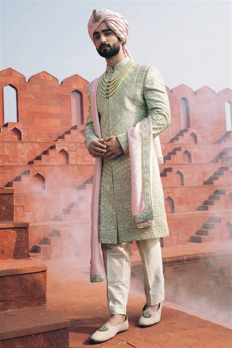 Pistachio Green Colored Sherwani with Heavy Embroidery and Stone Work in Silk